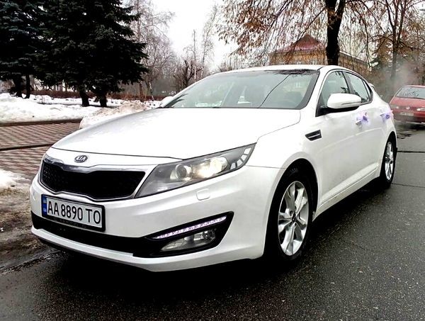 228 Kia Optima білий 
