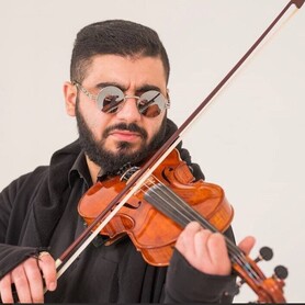 Скрипач Эмиль Алиев