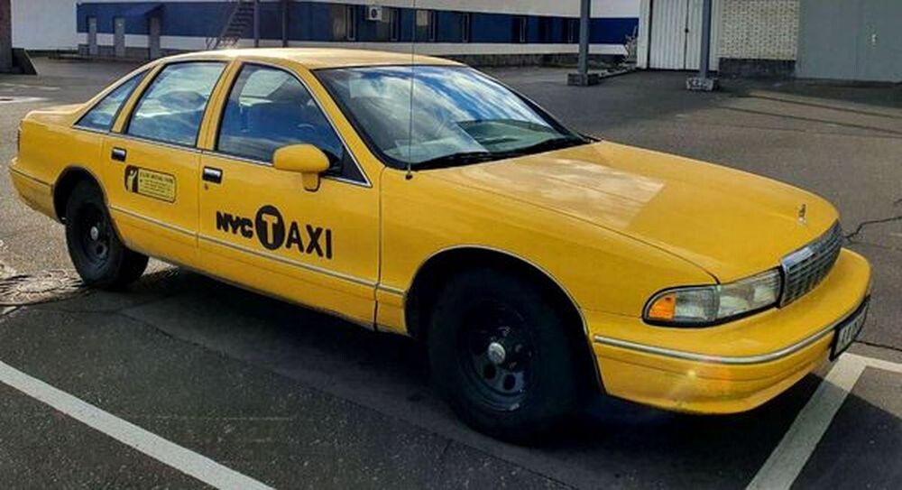115 Chevrolet Caprice жовте таксі 